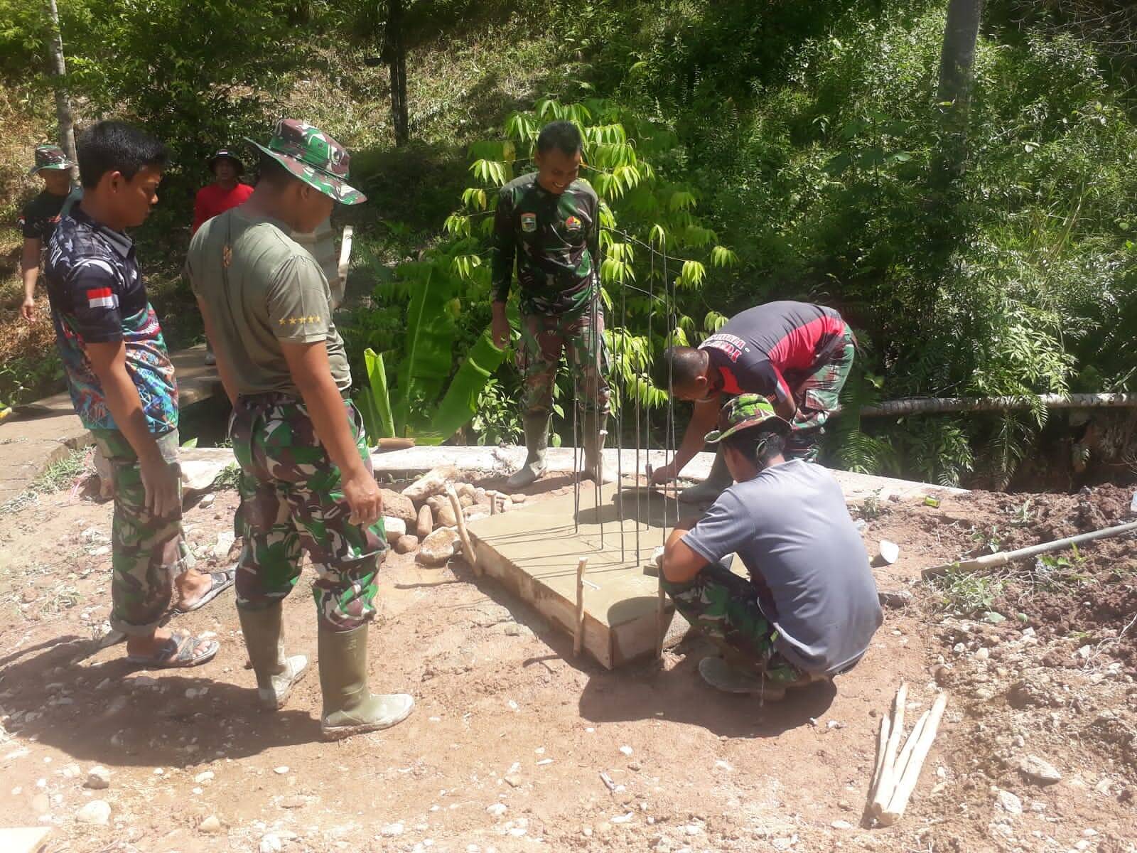 Satgas TMMD Ke 115 Kodim 0311/Pessel Bangun Tugu Prasasti