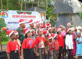 Satgas Yonif 122/TS Gelar Lomba Vocal Group Lagu Natal di Perbatasan RI-PNG.