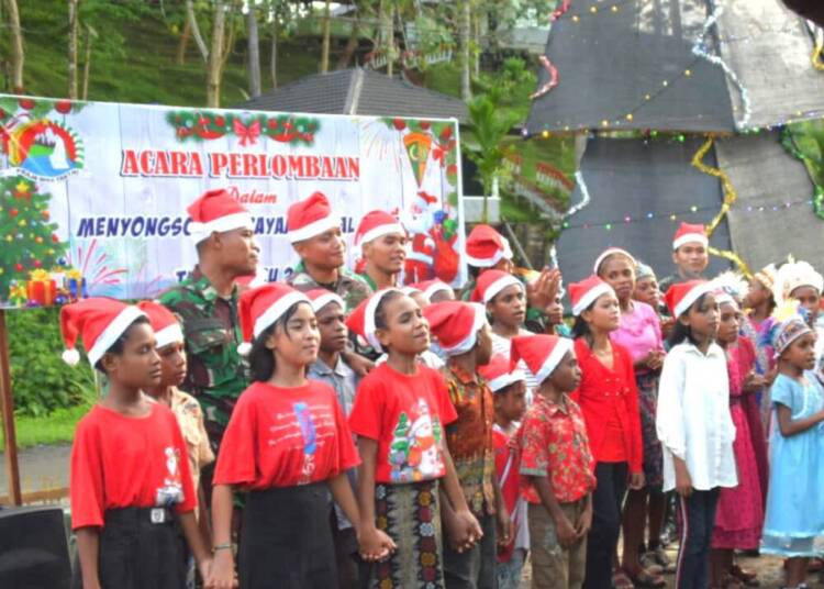 Satgas Yonif 122/TS Gelar Lomba Vocal Group Lagu Natal di Perbatasan RI-PNG.