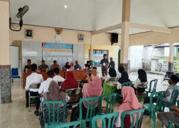 Highlight Sinergitas TNI-Polri dan Pemcam, Serka Widodo Kawal Transparansi Seleksi Perangkat Desa Beru